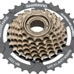 PIÑON ROSCA 7C SHIMANO TZ31 14-34 MEGA MARRON/NEGRO